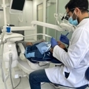 الدكتور ارحيو علي طبيب أسنان